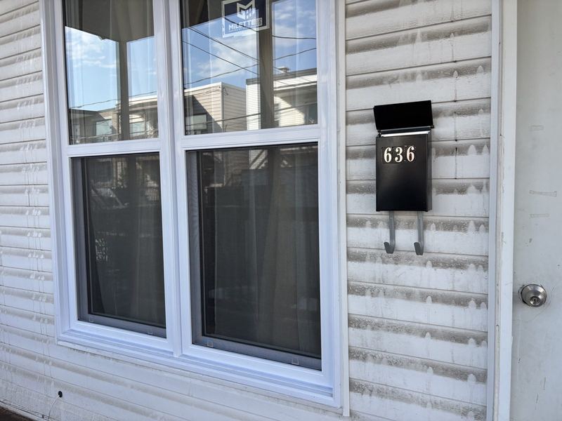 Revêtement de maison propre après un lavage à haute pression